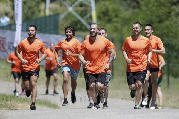 Sofia, Bulgaria - July 9, 2016: Participants are running in a group at the Legion Run extreme sport