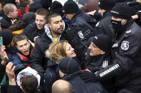 Sofia, Bulgaria - 12 January, 2022: People try to enter the Bulgarian Parliament building during a