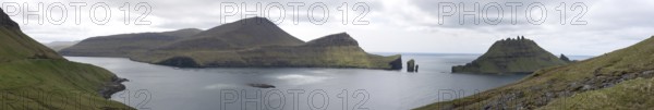 Panorama of Vagar and Tindholmur on the Faroe Islands with salmon farm, Faroe Islands, Denmark,