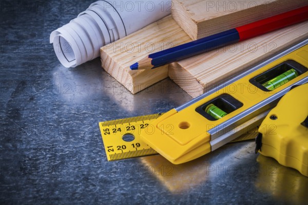 Great number of construction working tools on metallic scratched background architecture and
