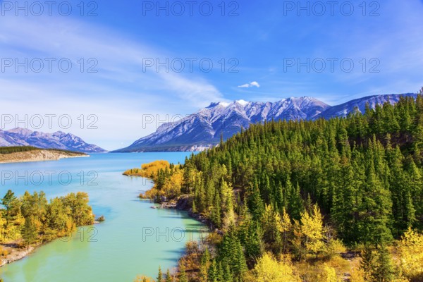 The picturesque Abraham lake in the mountain valley of the Rockies of Canada. Concept of active,
