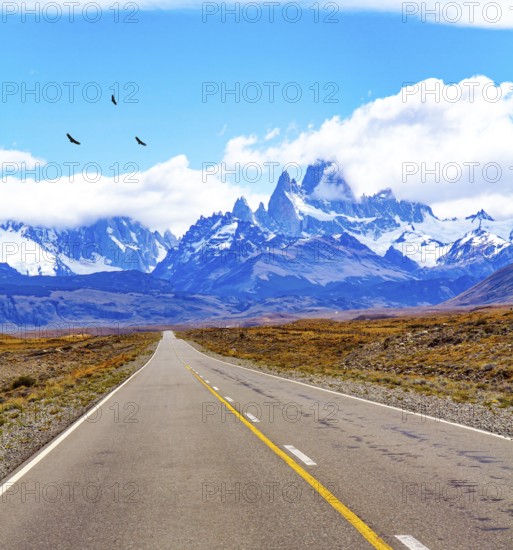 The road to the famous Mount Fitzroy. The famous peaked rock monoliths are illuminated by the sun.
