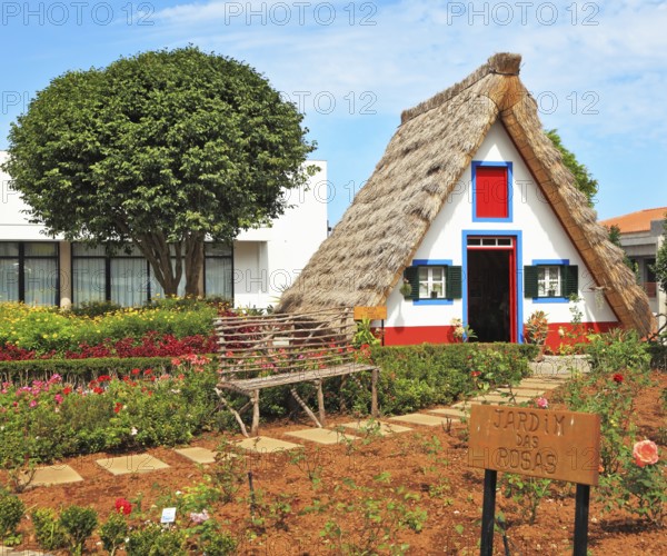 Old house-museum of the first settlers on the island of Madeira. Charming white cottage with a