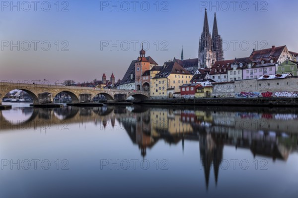 View over the Danube to the Regensburg Cathedral and the Stone Bridge in Regensburg, Bavaria,
