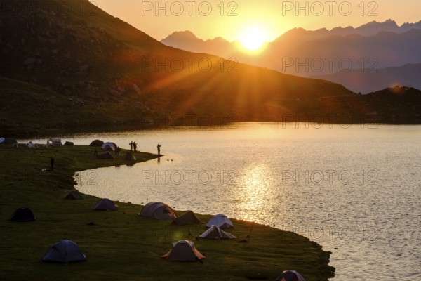 First light in the morning front Midi d Ossau, Gentau lake, Ayous lakes tour, Pyrenees National