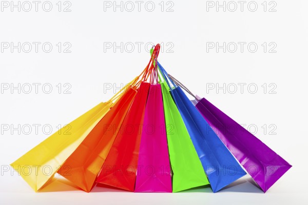 Set of colorful empty shopping bags isolated on the white background. Sale, consumerism,