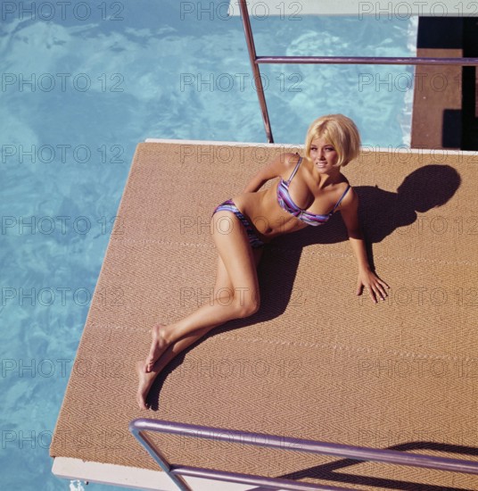 1960s bikini fashion. Actress and model Janet Ågren in her native town Landskrona. Born 6 April