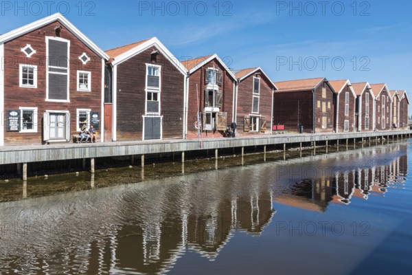 Hudiksvall, Halsingland, Gavleborg County -Sweden, 08 01 2019 Reflecting fishing warehouses in the