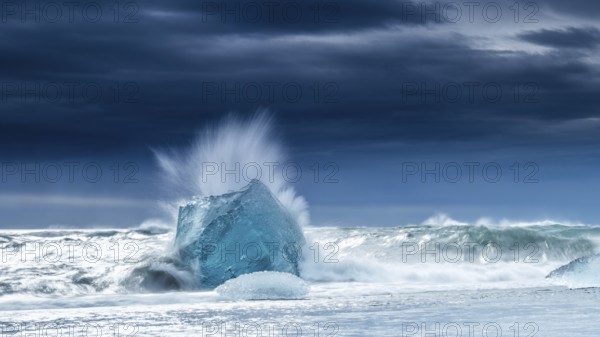 Diamond Beach, iceberg in the surf, near Jökulsarlon glacier lagoon, Vatnajökull National Park,