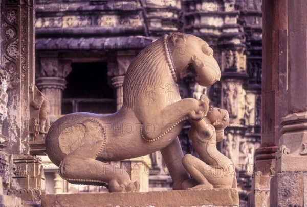 Sculptures of a mythical lion and woman at the Kandariya Mahadeva in Khajuraho, Madhya Pradesh,