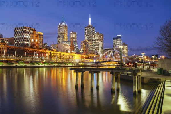 Melbourne, Australia, July 2 2013: Melbourne skyline along the Yarra River at dusk in Victoria