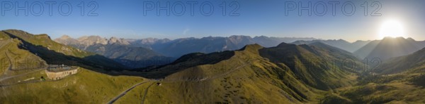 Morning atmosphere, aerial view, panorama at Colle Basset with Assietta ridge road, Sauze d'Oulx,