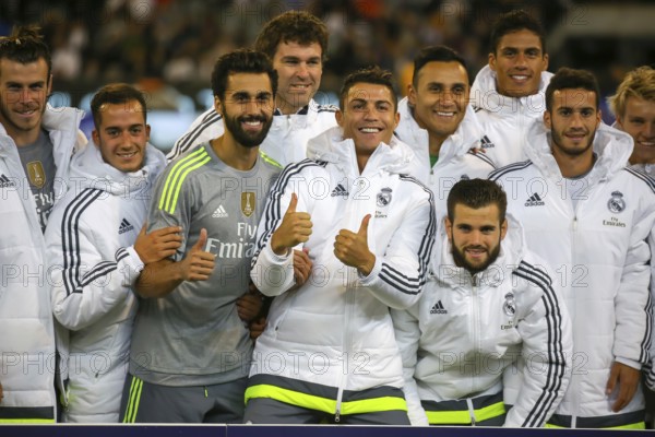 MELBOURNE, AUSTRALIA, JULY 24: Cristiano Ronaldo and team mates celebrate winning the 2015