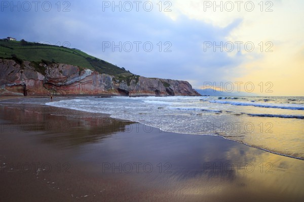 Low tide in the Atlantic. Playa Zumaya. Flysch - unique landscape of underwater rocks exposed at