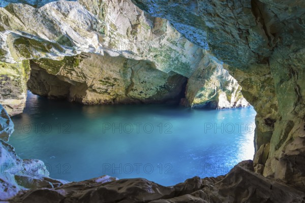 Karst cave Rosh-a-Nikra on the shores of the Mediterranean Sea. Israel. The color of sea water
