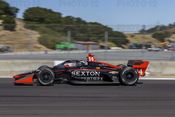 SANTINO FERRUCCI (14) of Woodbury, Connecticut practices for the Firestone Grand Prix of Monterey