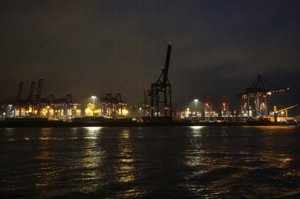 Illuminated container terminal with cranes in the Port of Hamburg, night shot, Hanseatic City of