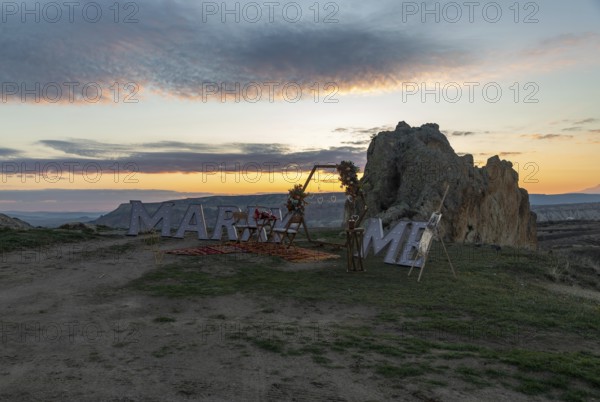 A picture of the Marry Me sign atop Love Valley, part of the Goreme Historical National Park, at