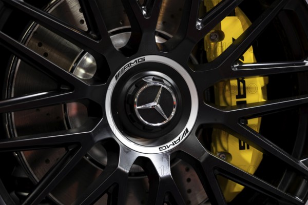 Sofia, Bulgaria - 3 June, 2022: Close-up of Mercedes-Benz logo is seen on a wheel of a car with