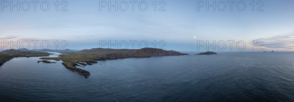 Panorama drone view of the Iveragh Peninsula with Valentia Island and Portmagee at sunset