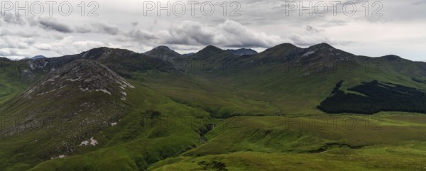 Panorama landscape view of the Twelve Bens mountains in Connemara National Park in County Galway of