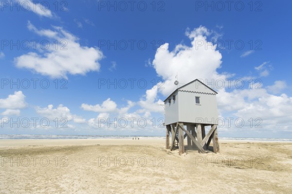 Drowning house at the beach from Dutch wadden island Terschelling