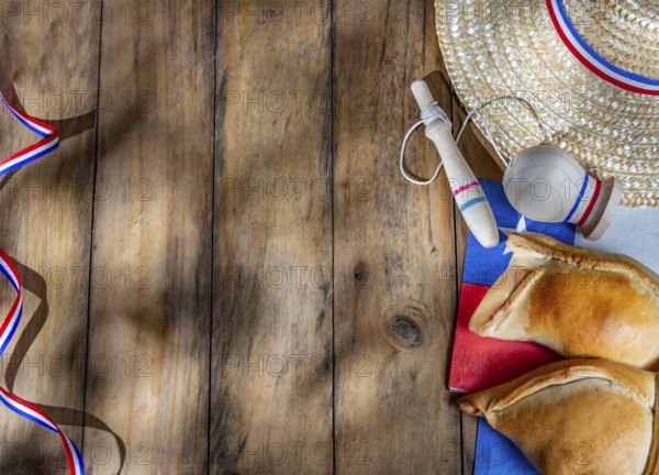 Food, Chilean independence day concept. fiestas patrias. Tipical baked empanadas, wine or chicha,