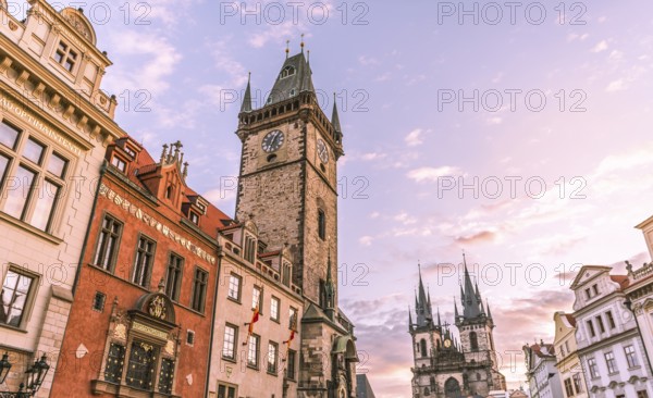 Image with the clock tower and the Church of our Lady before Tyn, at sunrise, in the Old Town