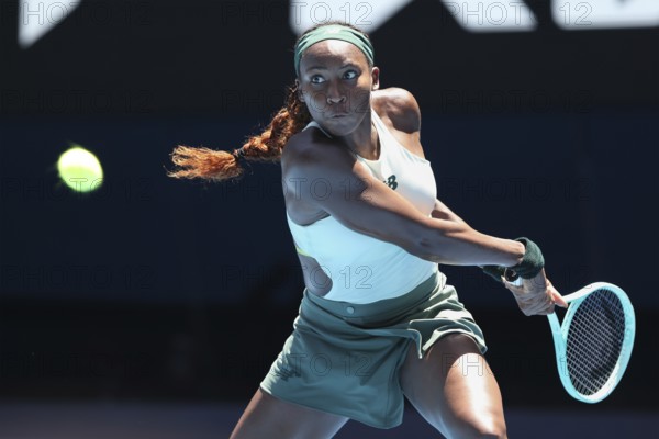 American tennis player Coco Gauff (USA) playing a backhand shot at the Australian Open 2025