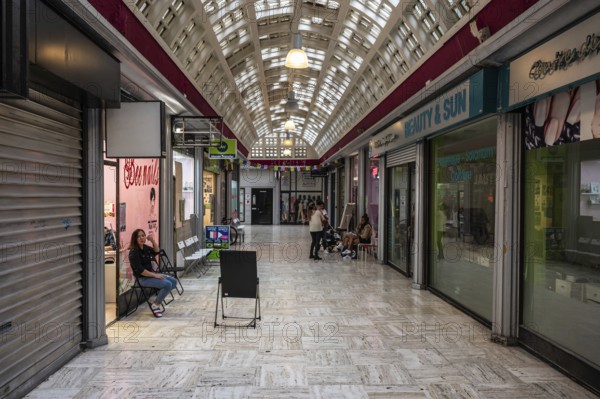 Brussels Old Town, Belgium, 10 28 2022, Art deco interior design with nail shops of the central