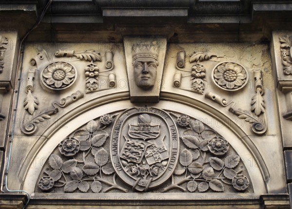 Sowerby bridge, west yorkshire, united kingdom, 16 july 2019: carved heraldic logo over the former