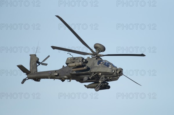 Agusta Westland AH-64 Apache helicopter aircraft in British Army air corps colours flying, England,