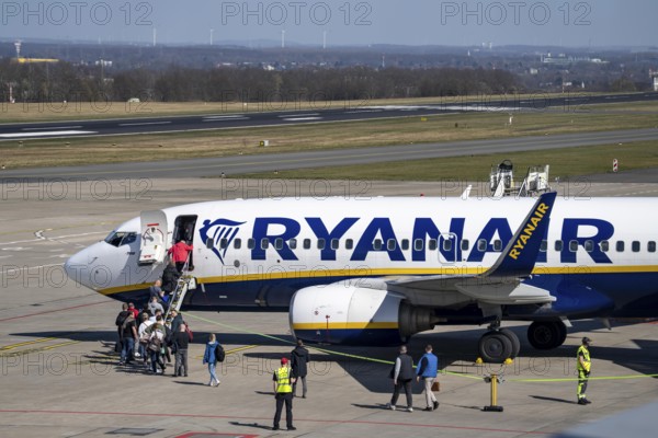 Dortmund Airport, Ryanair Boeing 737 on the apron, passengers boarding, regional airport, many