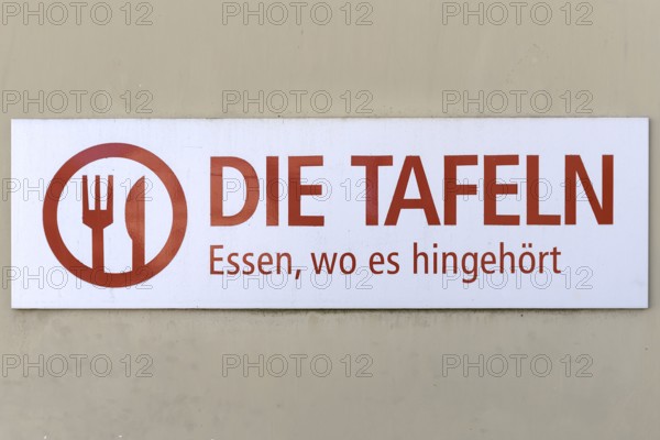 Sign of a food bank, food distribution for the needy, on a house wall, Franconia, Bavaria, Germany,
