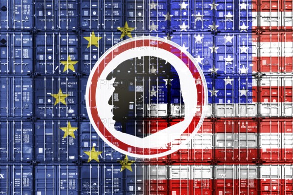 Sign with silhouette of Donald Trump in front of stacked containers with European and US flags,