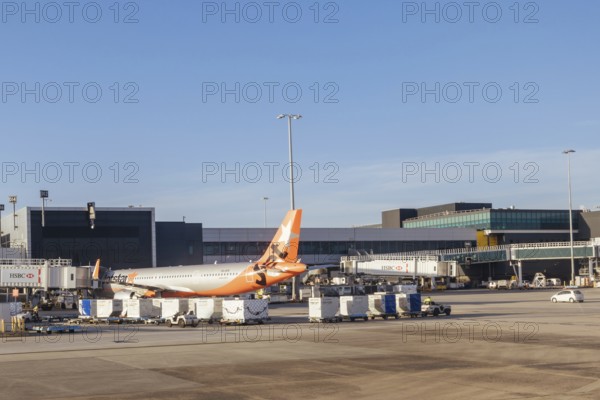 Melbourne, Australia, March 03 2023: Jetstar aircraft at boarding gates at Melbourne Tullamarine