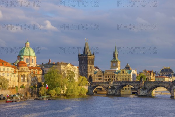 Charles Bridge (Karluv Most) on Vltava river and Old Town Bridge Tower, famous tourist destination