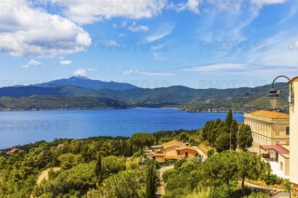 View of the Stella Gulf from Capoliveri, Monte Capanne in clouds in the background, Elba Island,