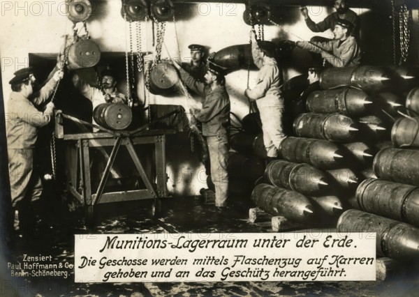 Underground ammunition storage room. The shells are lifted onto carts using a pulley and brought to