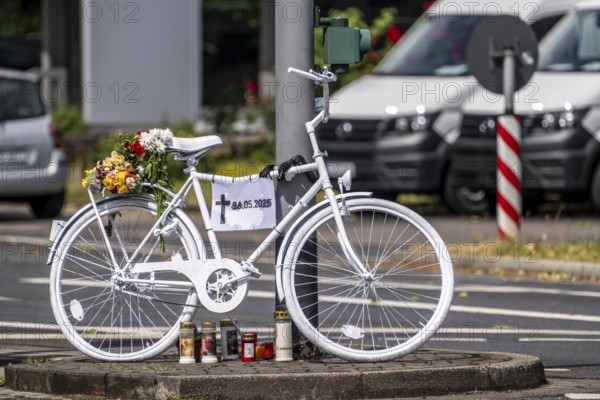 A ghost bike at the scene of an accident where a cyclist was run over by a lorry two days earlier