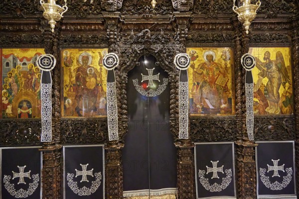 Altar wall, series of religious icons and symbols in graphic style with elaborate decorations, Holy