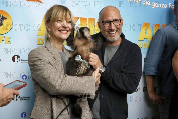 Heike Makatsch and Benno Fürmann at the Berlin premiere of AKIKO - DER FLIEGENDE AFFE at the