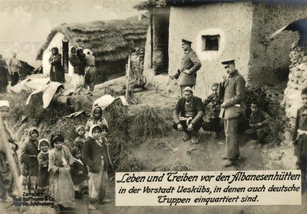 Life and bustle in front of the Albanian huts in the suburb of Ueskübs, where German troops are