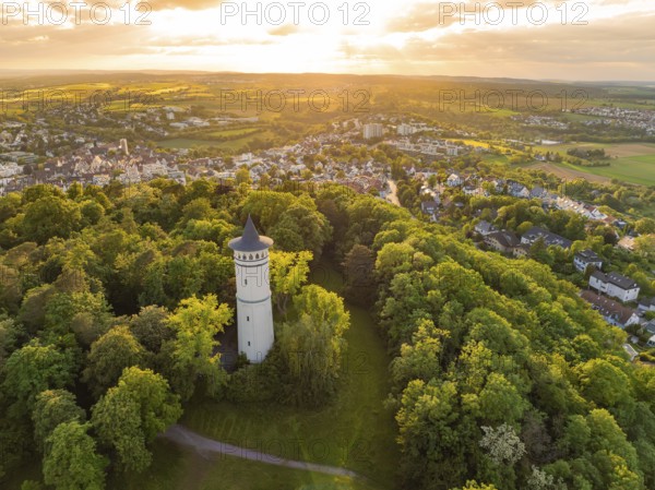Landscape with tower in the forest at sunset and view of the village, Engelberg Tower, Leonberg,