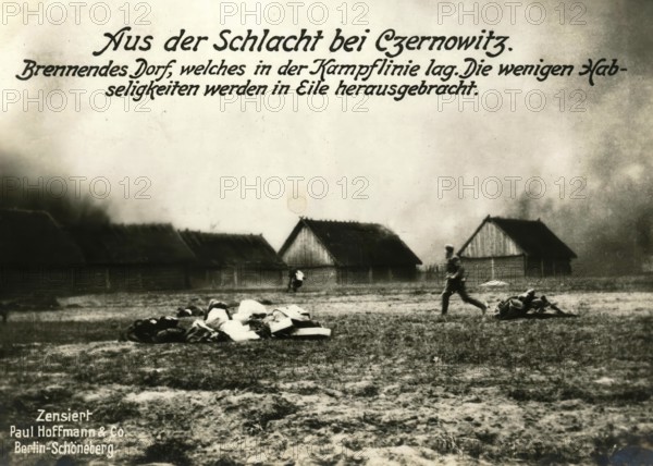 From the Battle of Czernowitz. Burning village, which lay in the battle line. The few belongings