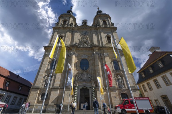 Parish and pilgrimage church of the Holy Trinity, basilica in Gößweinstein with pilgrimage flags,