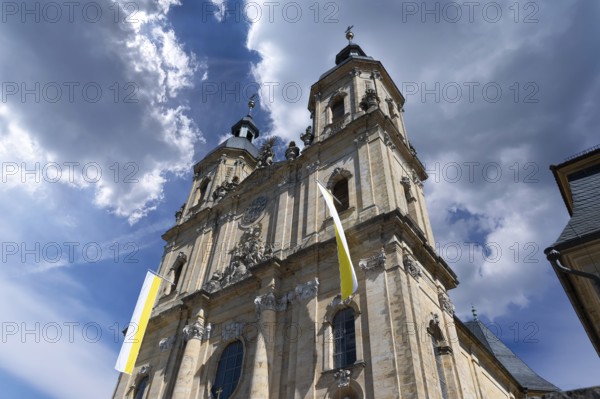 Parish and pilgrimage church of the Holy Trinity, basilica in Gößweinstein with pilgrimage flags,
