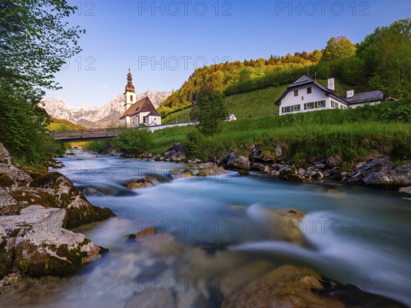 Parish church of St Sebastian on the Ramsauer Ache in the morning, Reiteralpe at the back, Ramsau,