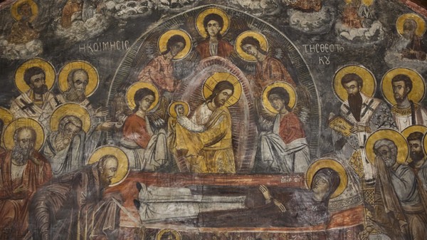 Fresco showing Christ with saints, many icons with golden decoration in an ornate frame, Easter