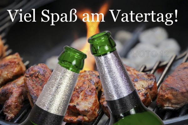 (Photomontage) Father's Day symbol: Two beer bottles in front of barbecued meat and text VIEL SPASS